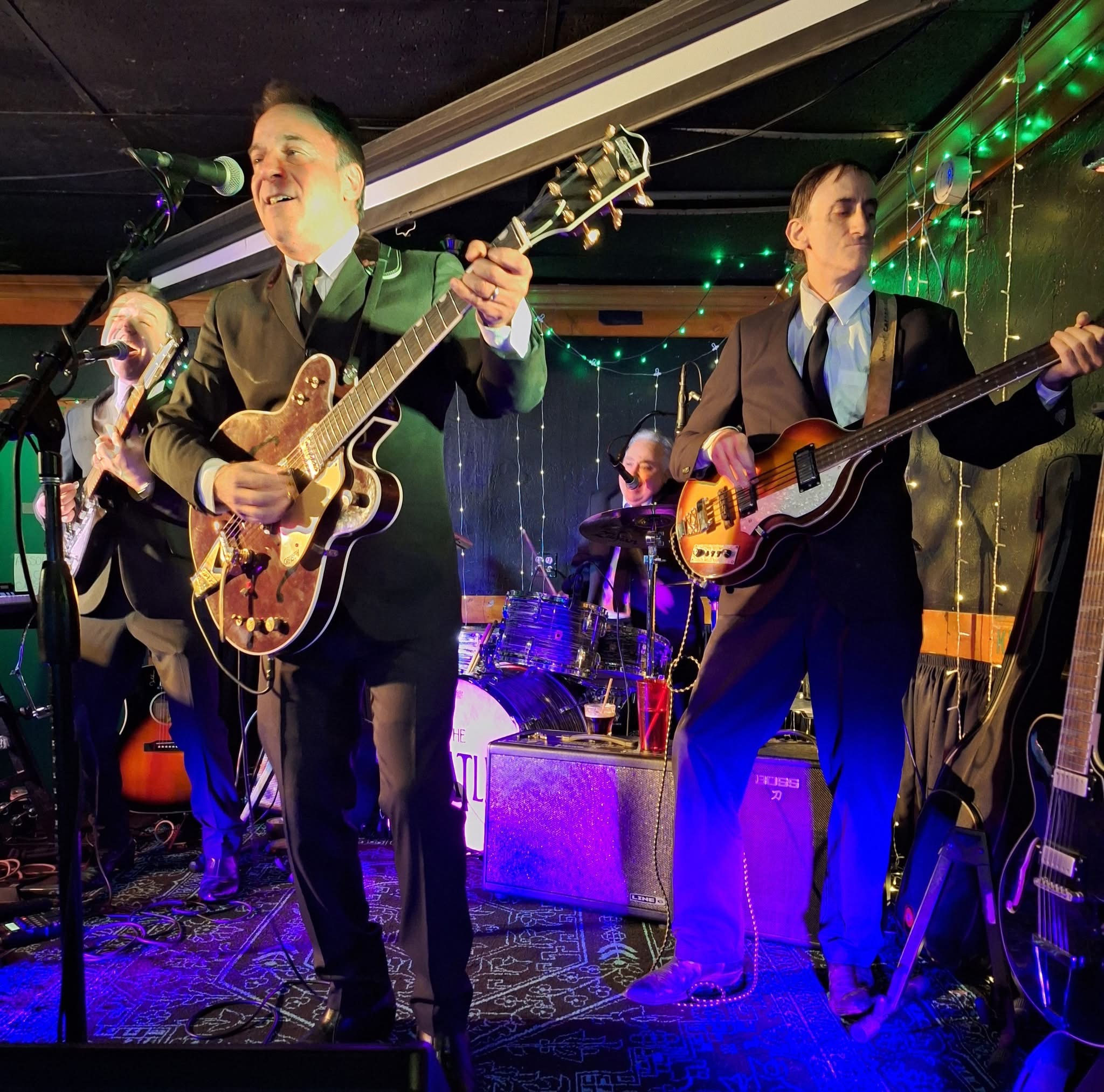 Boots & Suits performing to the room