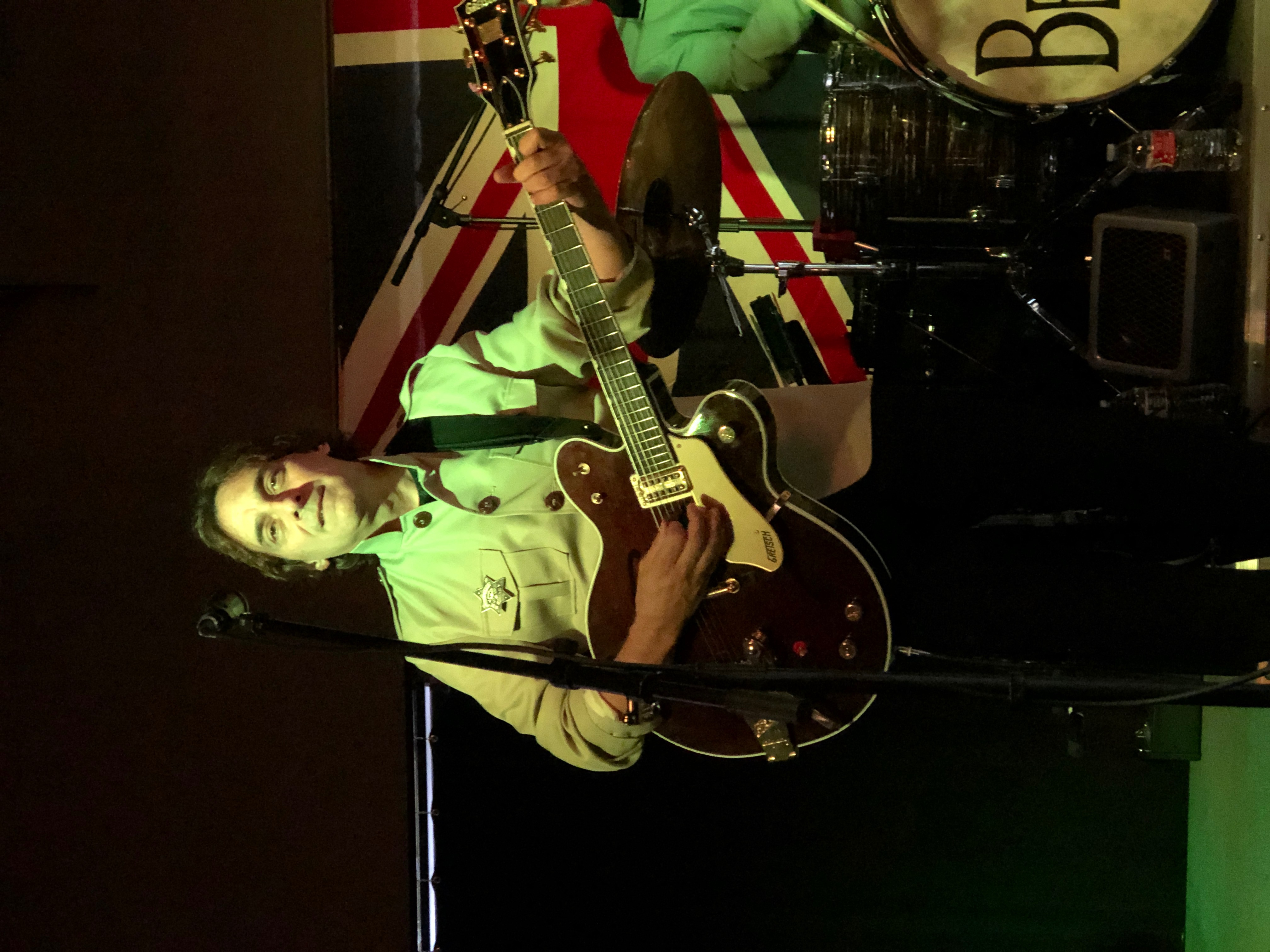 Boots & Suits bassist performing