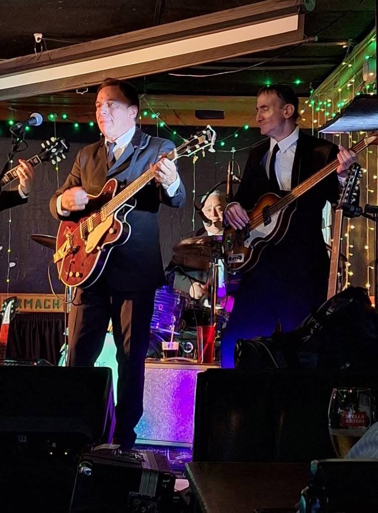 Boots & Suits guitarist and vocalist mid-song