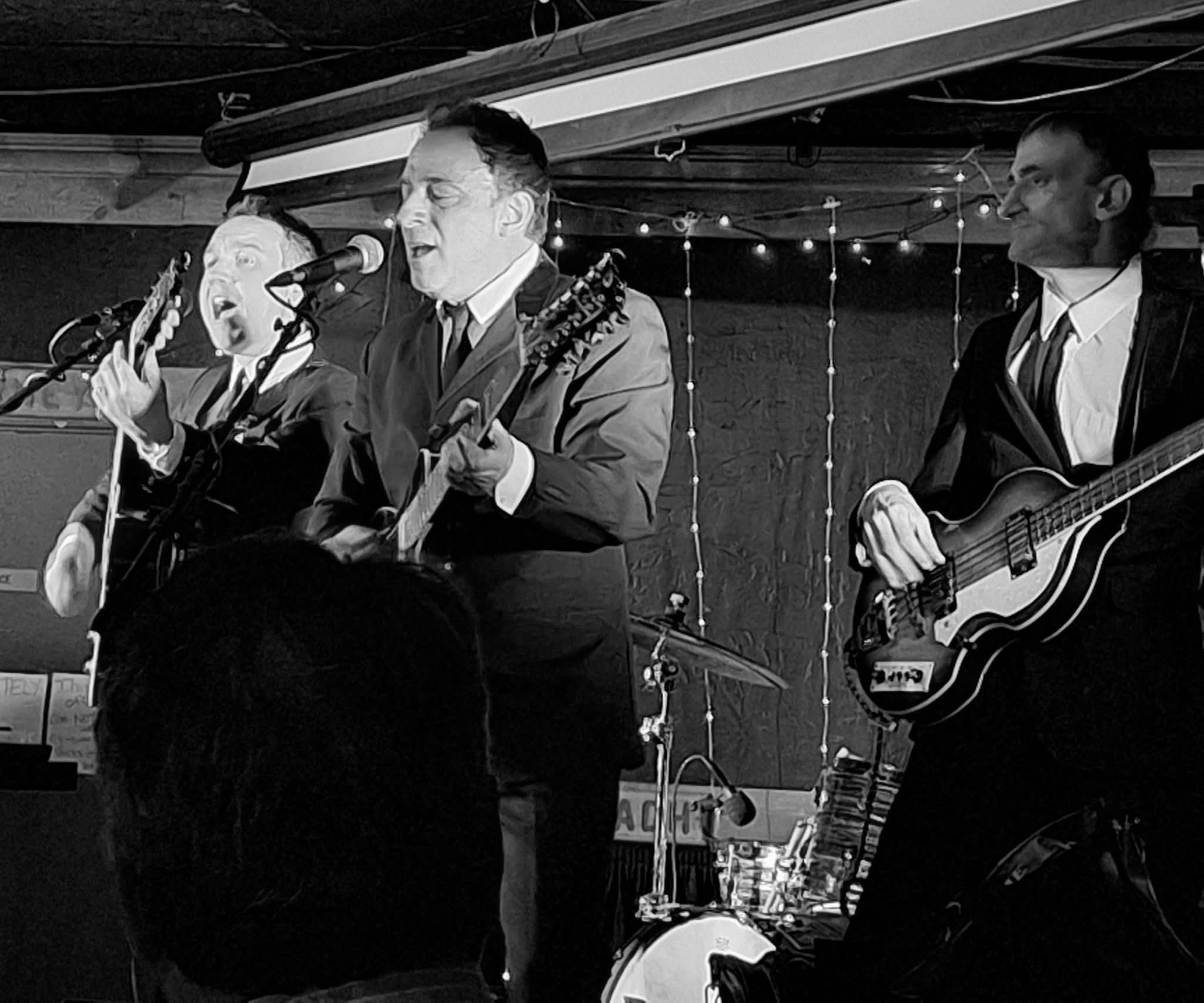 Boots & Suits singing to a packed room